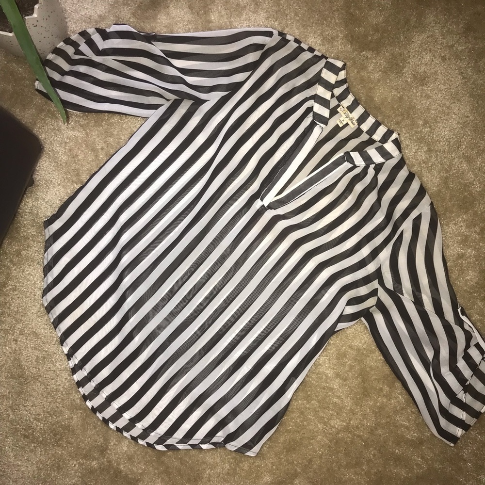 Striped black and white blouse.